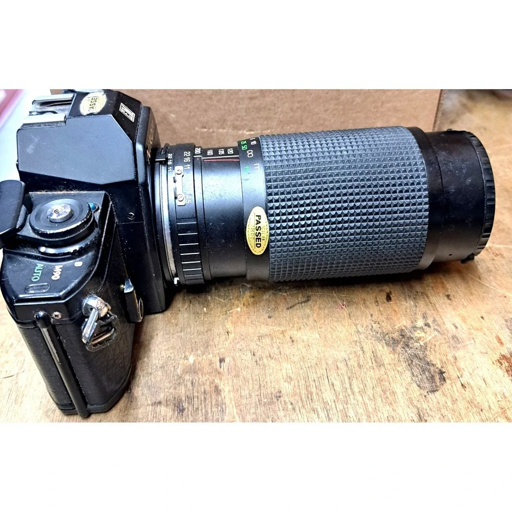 Vintage Nikon EM Black SLR Film Camera + Nikon Lens + Flash + Film + Manuals